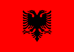 [Albanian flag]